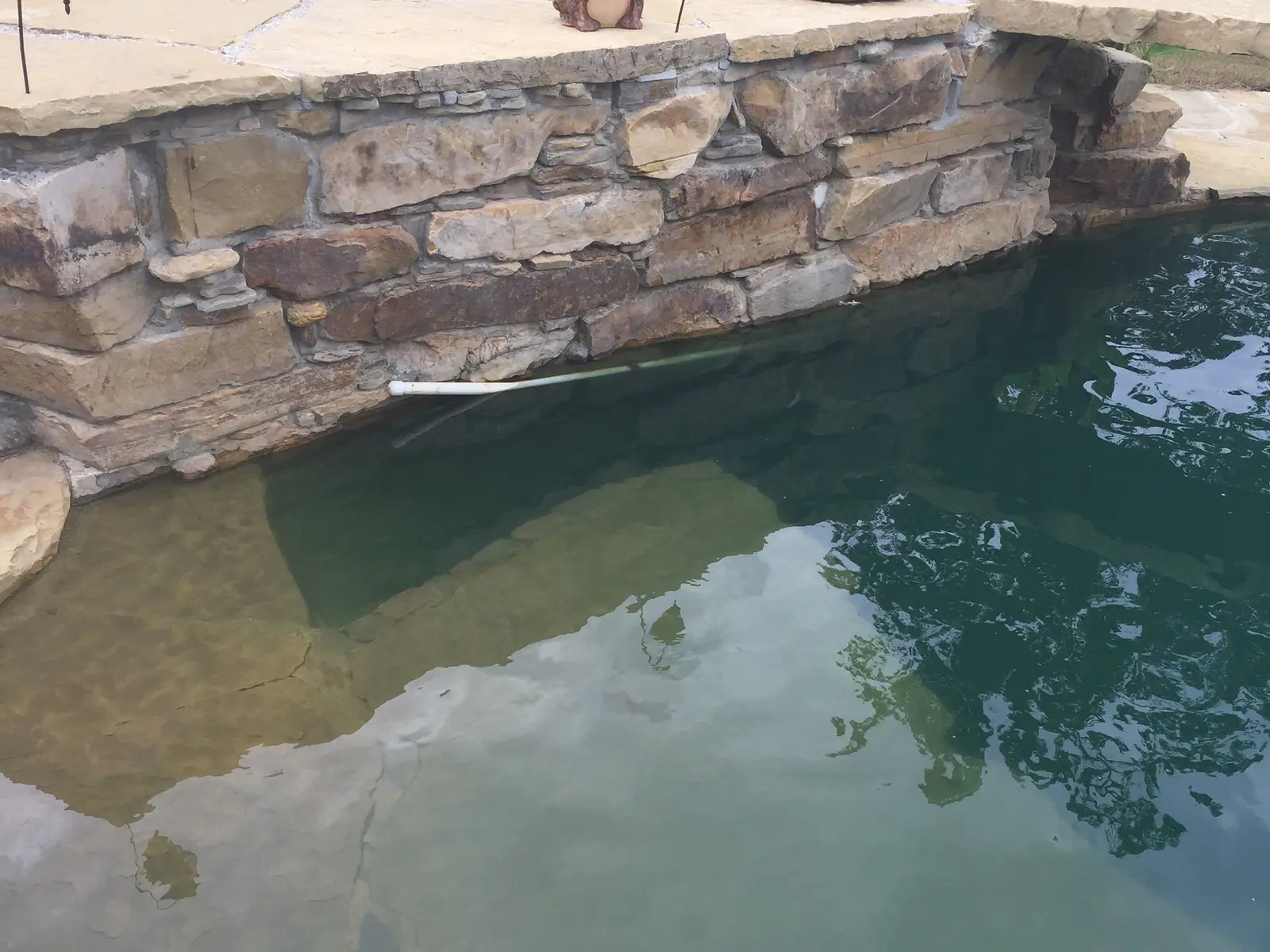 Natural Tennessee boulders used in a pool landscape