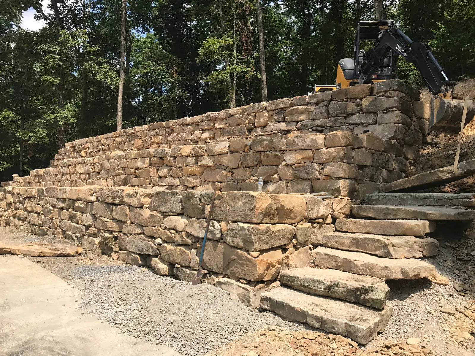 Landscape retaining wall built with Tennessee boulders