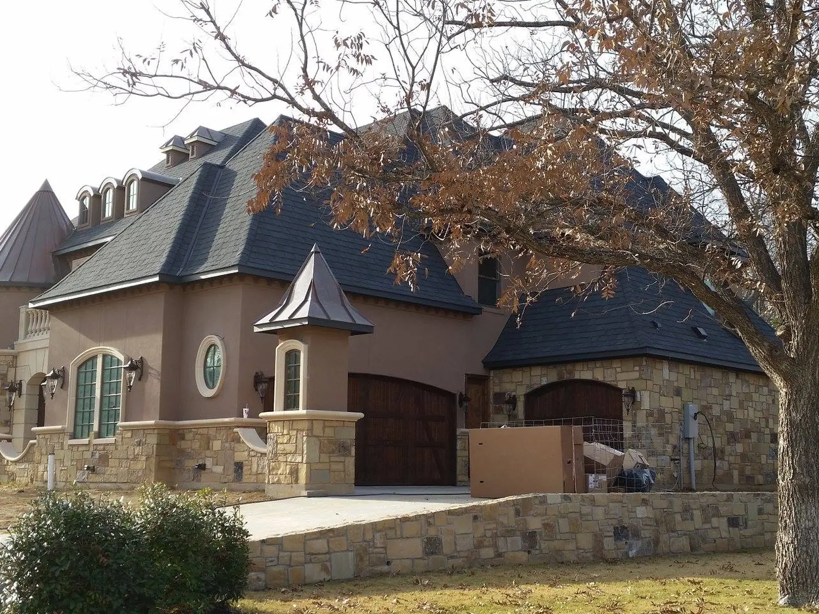 Completed house exterior with Tennessee Fieldstone ashlar