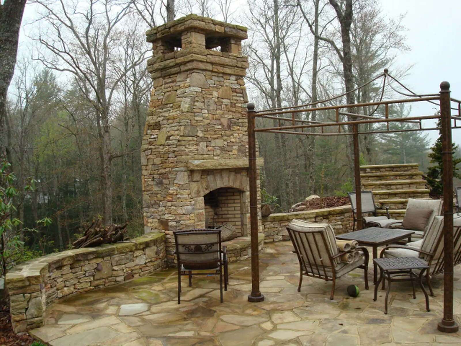 Covered porch finished with Tennessee Fieldstone masonry